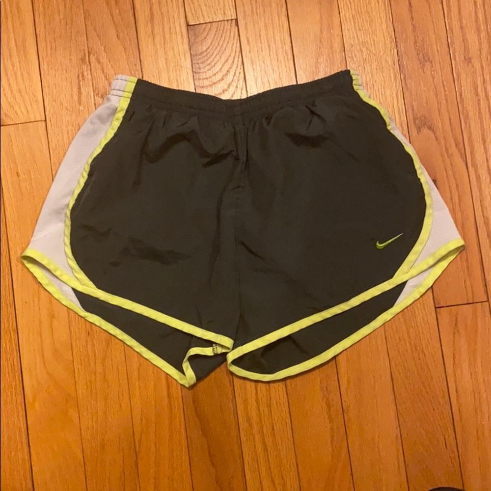 Gray nike shorts with neon yellow/green lining